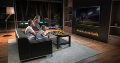 Modern Flames Orion Slim Fireplace Set on the Living Area With Family on Watching