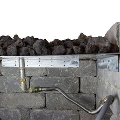 Warming Trends 19-Inch Paver Collar installed under fire pit with lava rock on plate
