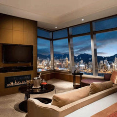 Modern Flames 52-inch Orion Slim Heliovision Fireplace Night View in Living Area and Tv on Top