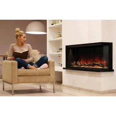 Modern Flames Built In Electric Fireplace with White Wall and Women on Chair